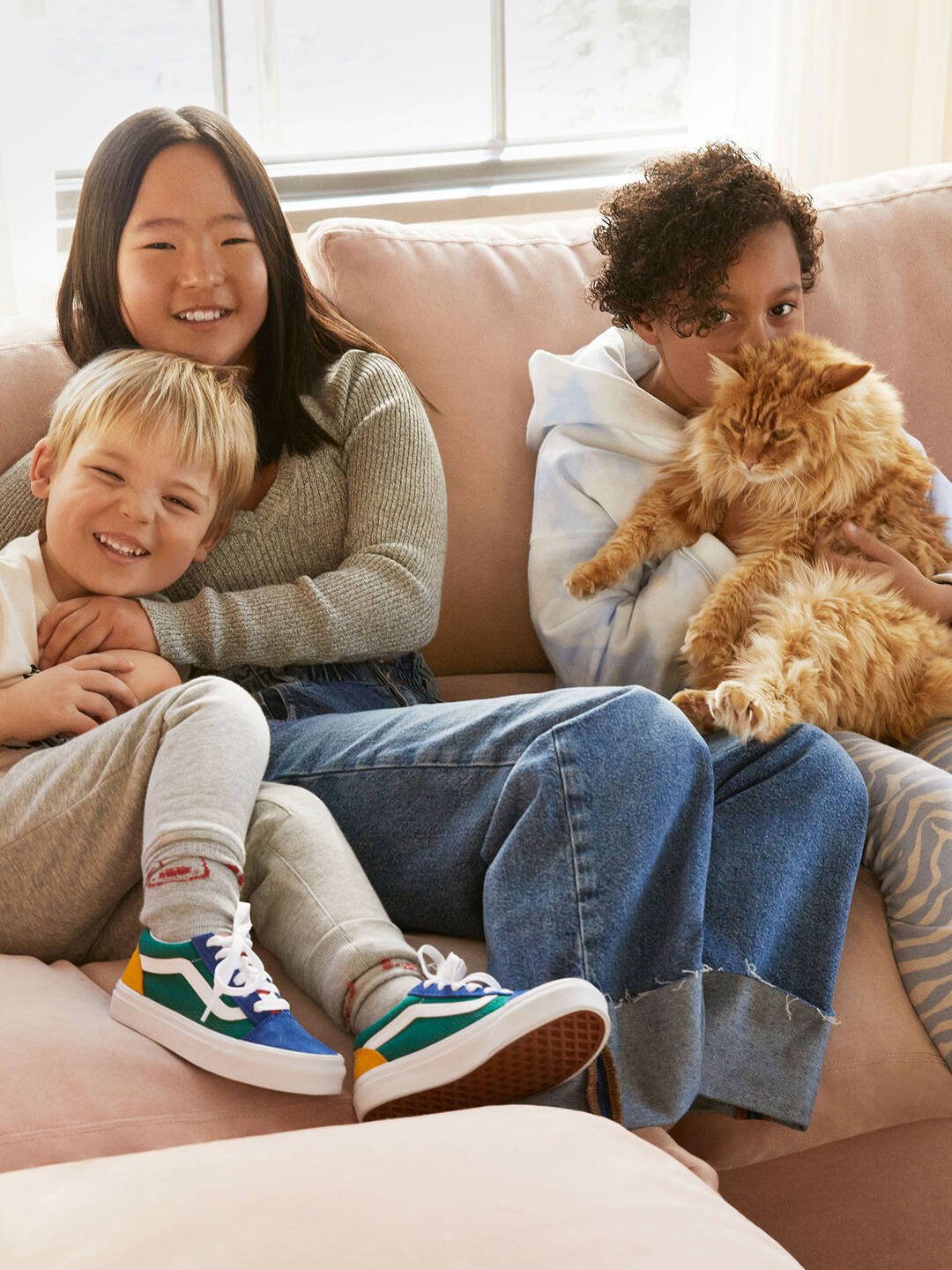 Parents Magazine: (L to R) Joshua Jr., Naleigh and Adalaide holding rescue cat Checkers