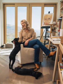 Katherine Heigl's Artwear: Katherine Heigl in her art studio in Utah with two of her rescue puppies.