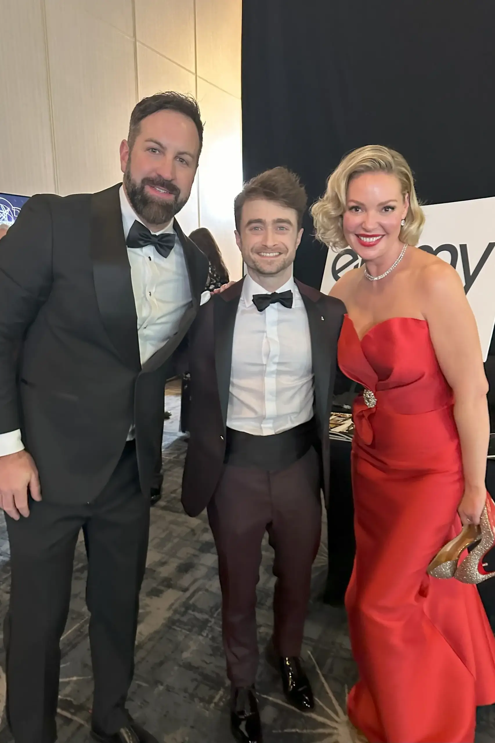 75th Emmy Awards: Josh Kelley and Katherine Heigl pose for a photograph with Daniel Radcliffe.